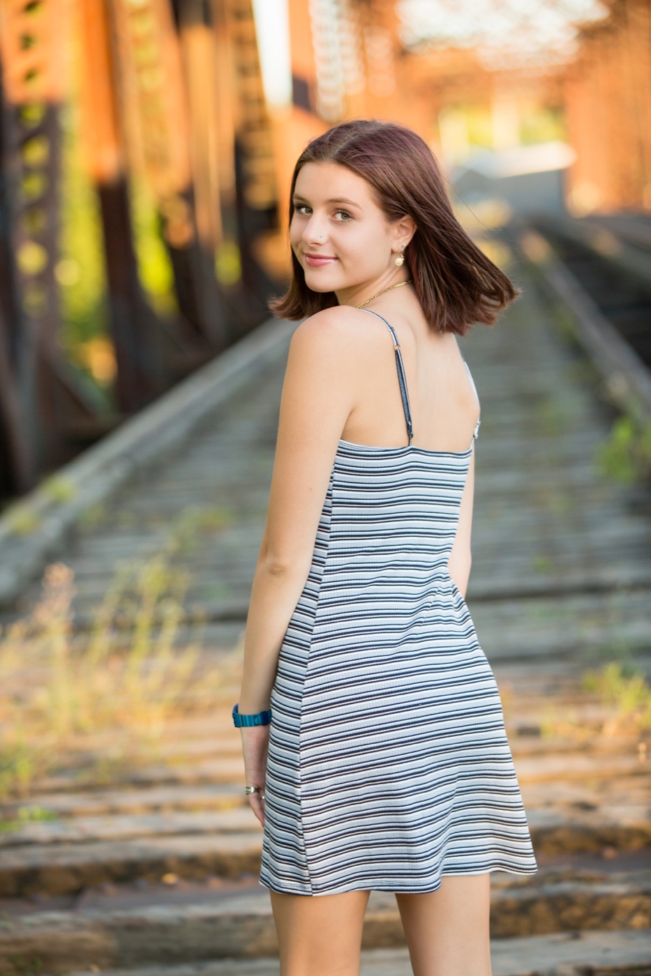 Senior portrait without cardigan showing the base outfit in downtown Grand Rapids Michigan — Jules K Photography