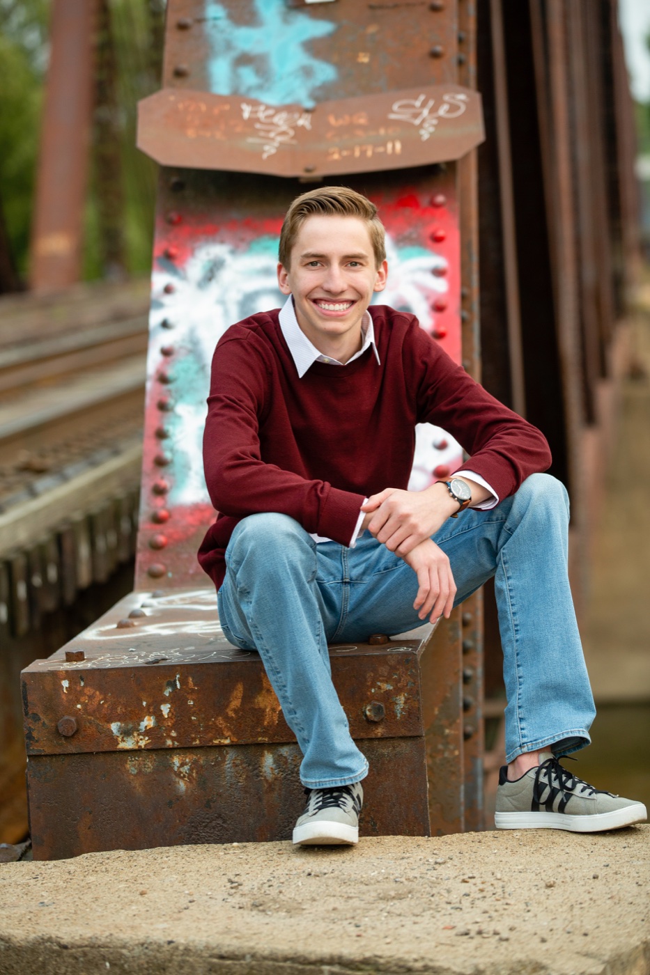 Senior guy in a henley in downtown Grand Rapids Michigan — Jules K Photography