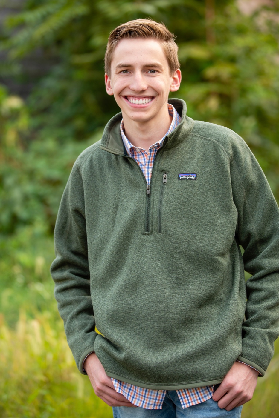 Senior guy in a lightweight sweater in downtown Grand Rapids Michigan — Jules K Photography