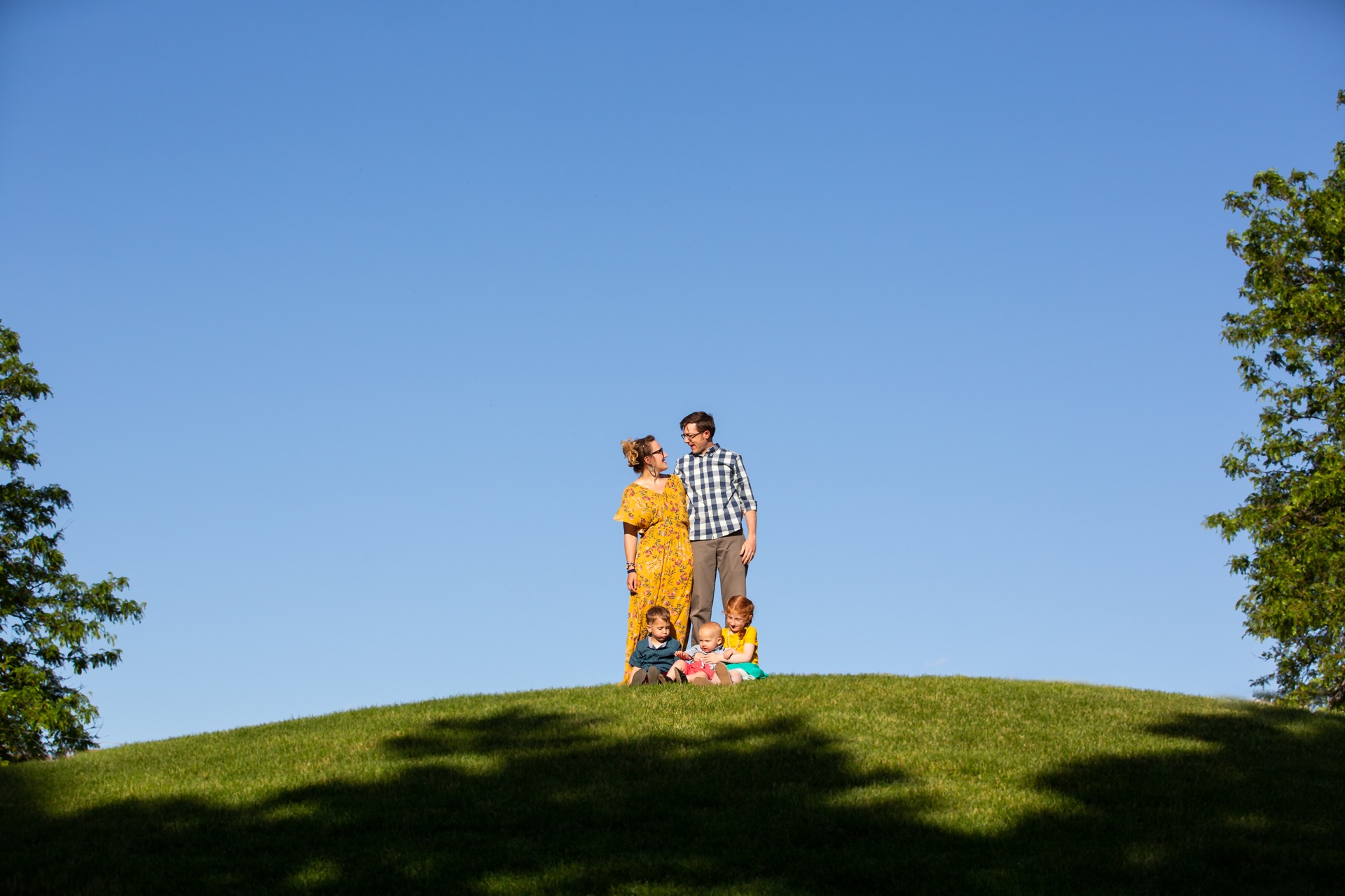 Family portraits on a summer hillside Grand Rapids