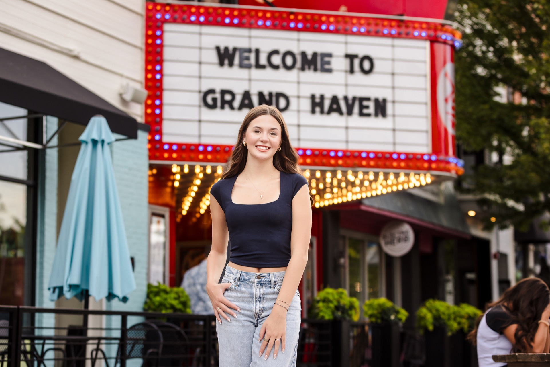 Senior girl portrait Grand Haven Michigan downtown marquee