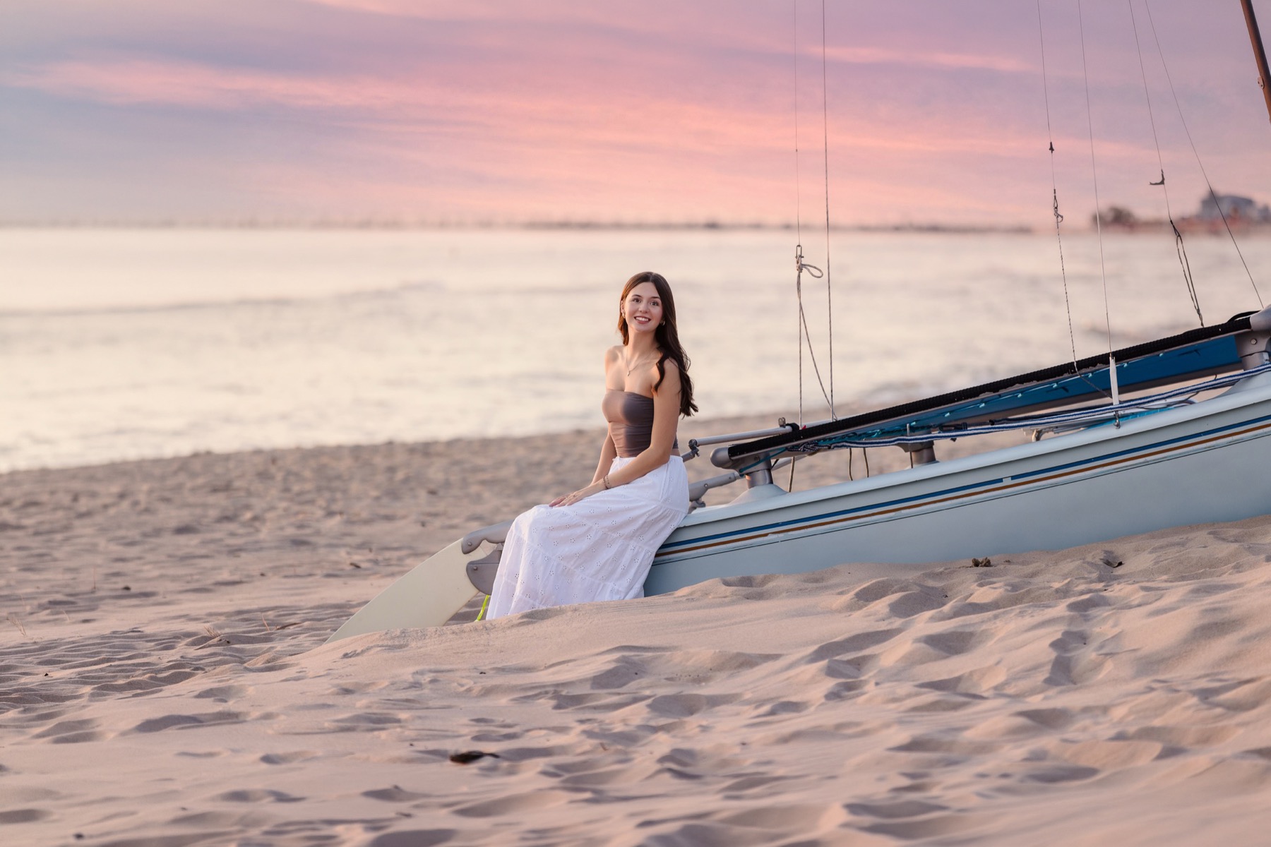 Julie King Grand Rapids portrait photographer with senior client outdoors